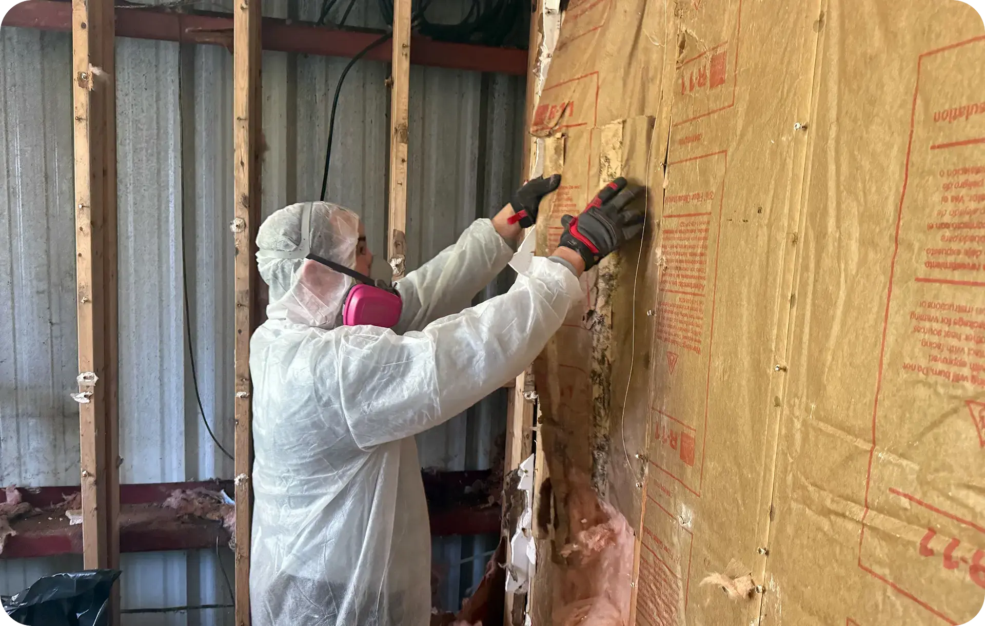 Technician marking inspection spot on floor